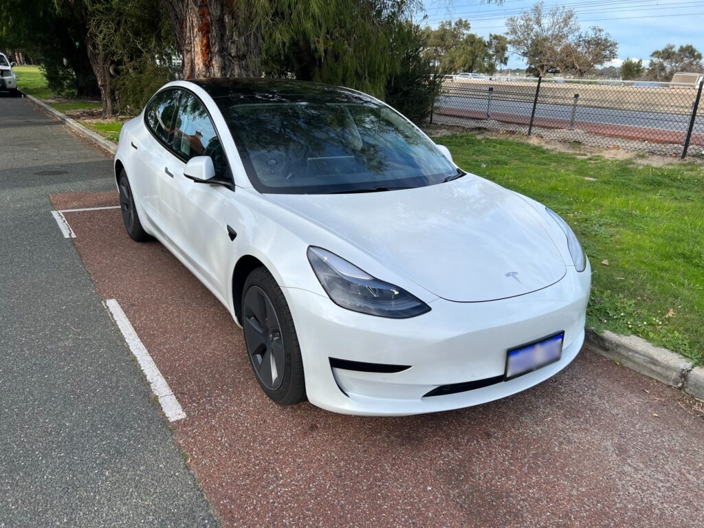 Peter Fitz with his Tesla, financed by Thrive Broking
